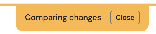 The Comparing changes label and the Close button